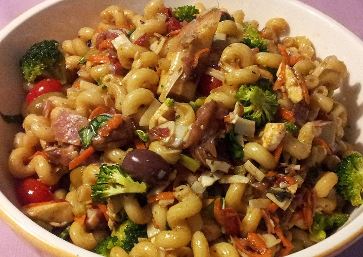 Pasta salad with vegetables in a white bowl tossed with Chef Tim's Sweet Balsamic Vinaigrette salad dressing and marinade. Made with 7 natural Ingredients and is Gluten Free & Cholesterol Free & No MSG
Makes a Great as a Gift for people who love to cook and desire to eat healthy, and/or gluten free. Made in USA.
"Shake, Shake, Shake. Don't Refrigerate"©