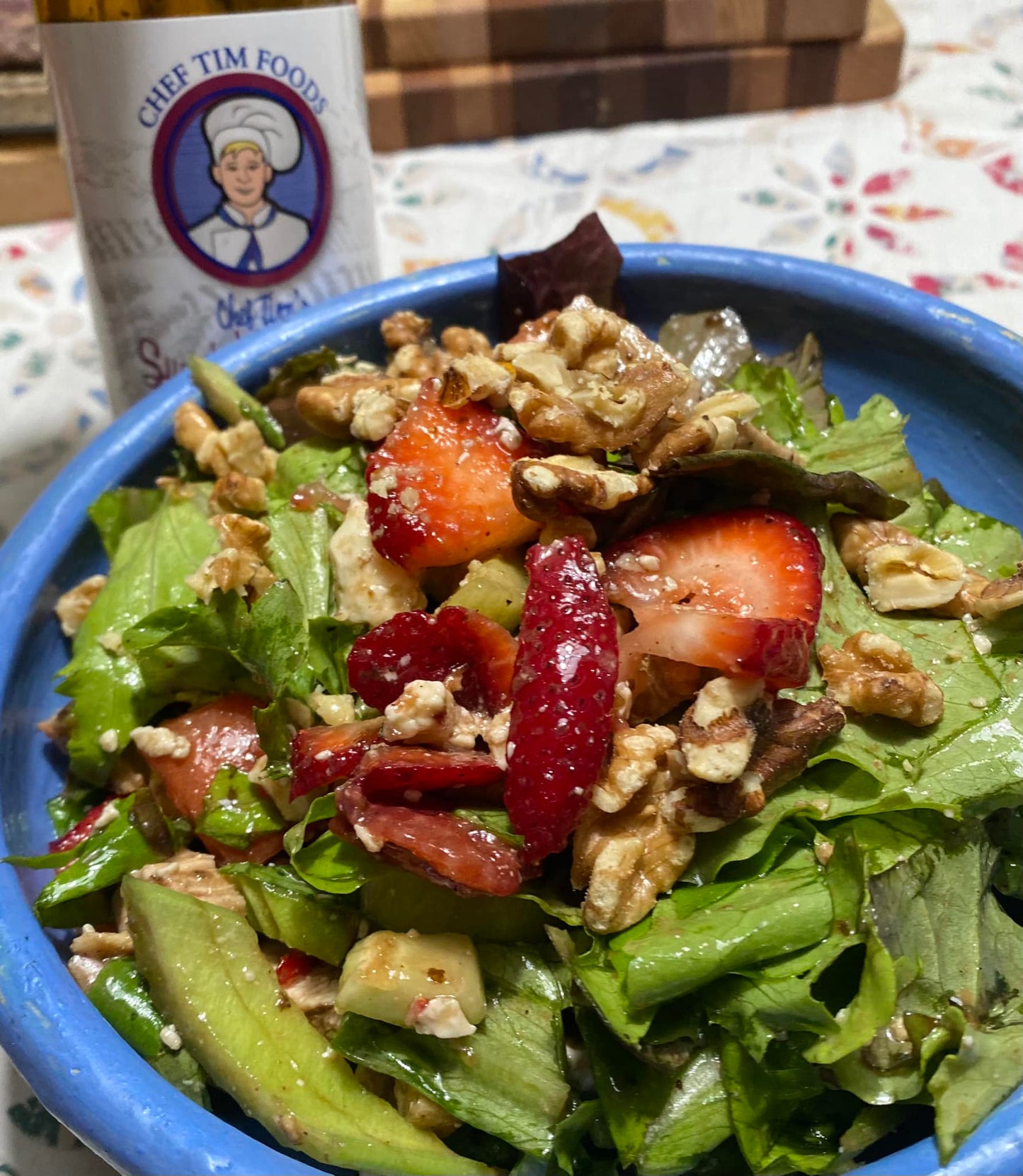 Strawberry Walnut Salad in a blue bowl tossed with Chef Tim's Sweet Balsamic Vinaigrette salad dressing and marinade.. Blue cheese crumbles green leaf lettuce. Made with 7 natural Ingredients and is Gluten Free & Cholesterol Free & No MSG
Makes a Great as a Gift for people who love to cook and desire to eat healthy, and/or gluten free. Made in USA.
"Shake, Shake, Shake. Don't Refrigerate"©