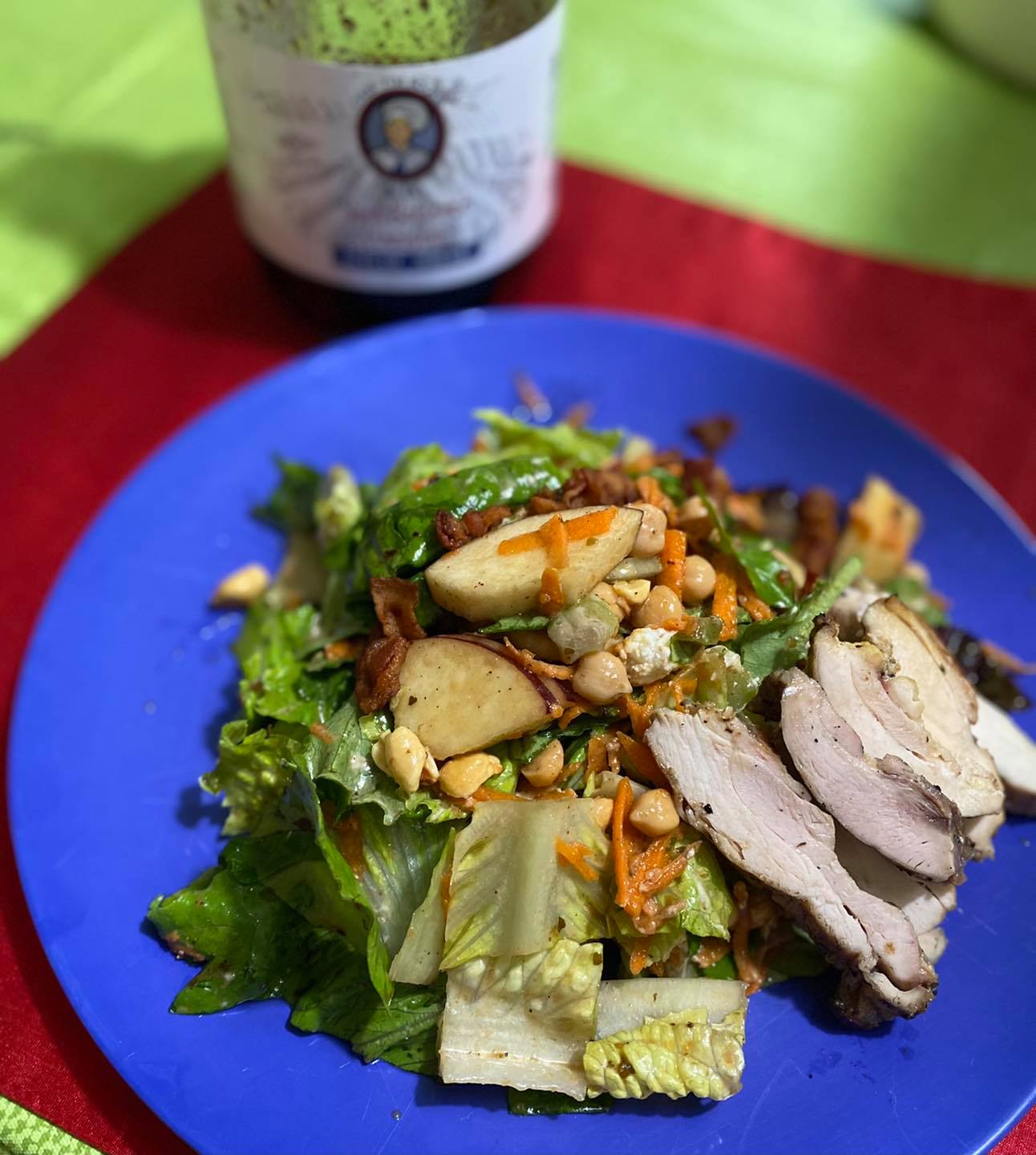 Chick Pea Salad with chicken on a blue plate with a container of dressing in the background.  Chicken and Apples ad carrots and lettuce tossed with Chef Tim's Sweet Balsamic Vinaigrette salad dressing and marinade.  Made with 7 natural Ingredients and is Gluten Free & Cholesterol Free & No MSG
 Makes a Great as a Gift for people who love to cook and desire to eat healthy, and/or gluten free.  Made in USA.
"Shake, Shake, Shake. Don't Refrigerate"©