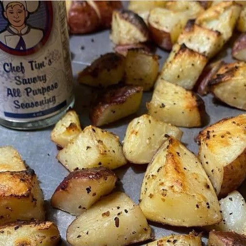 Roasted potatoes on a baking sheet with 'Chef Tim's Savory All Purpose Seasoning' container.  A delightful blend of spices for beef, pork, chicken, seafood, veal & lamb, including roasts, steaks, chops, loins, fillets, and burgers. Also great on roasted potatoes, fries, pizza, vegetables & soups.
"Anything that walked, swam flew or grew."
Gluten Free & Cholesterol Free & No MSG
Great as a Gift for anyone who loves to Cook, Grill or use in the Smoker. Made in USA.